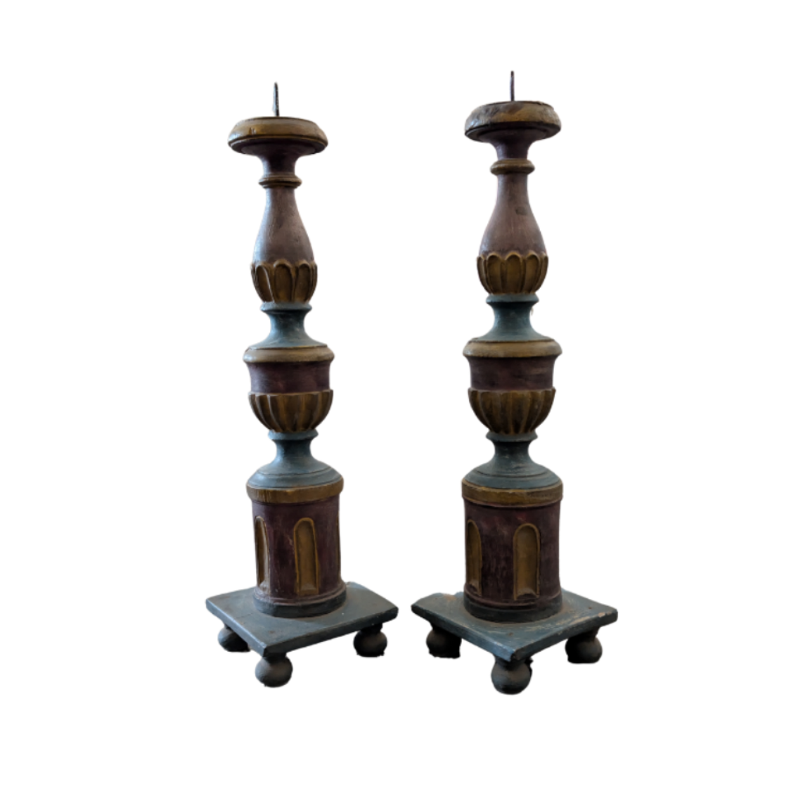 Pair of decorative candle holders on a white background