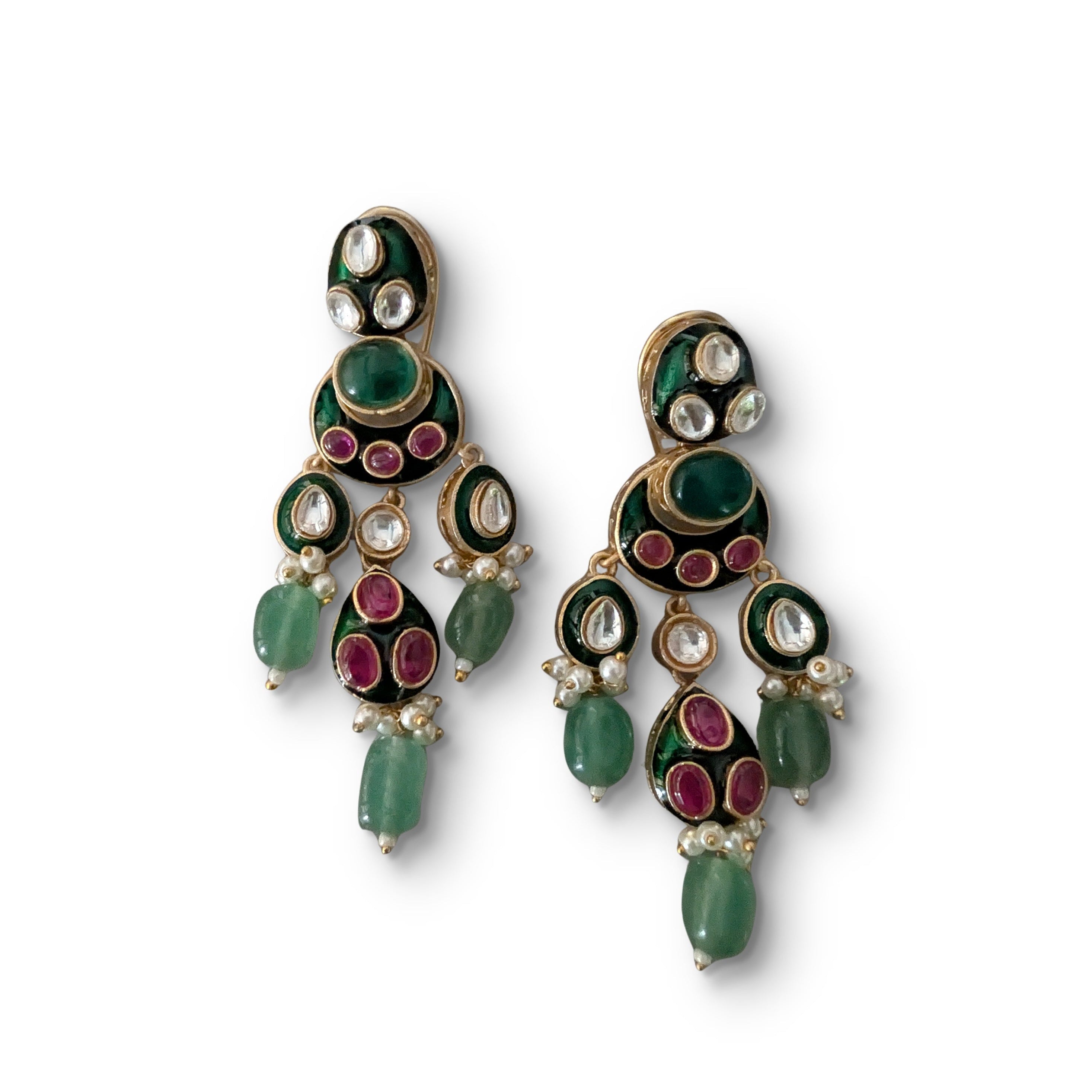Pair of green and gold earrings on a white background