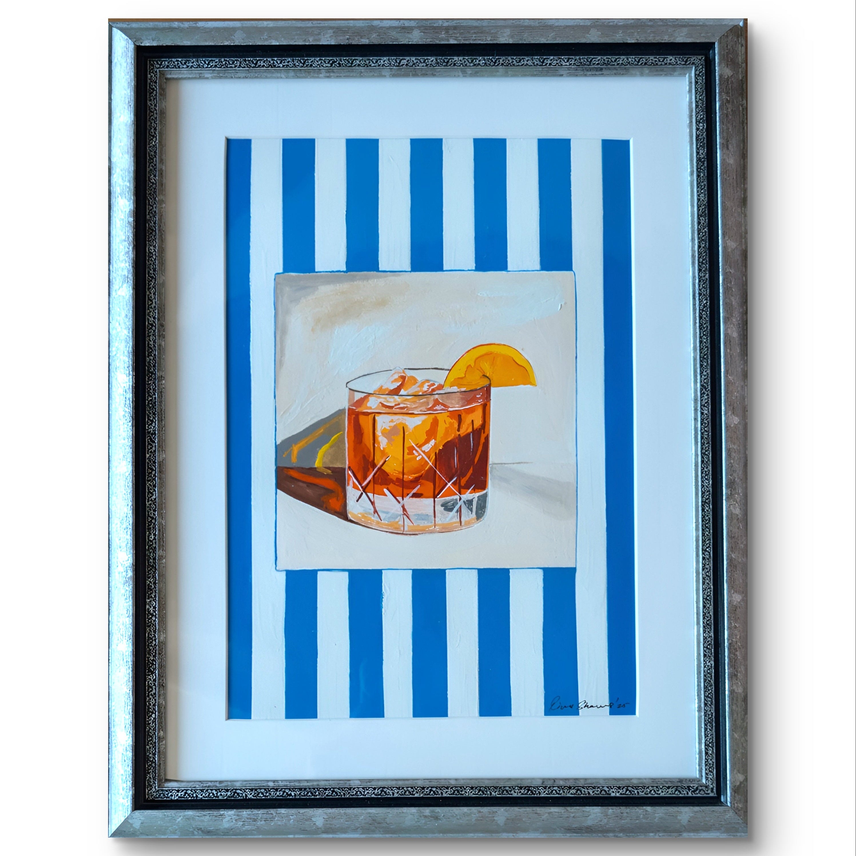 Framed artwork of a cocktail with a blue and white striped background
